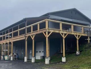 Riverside entrance to New Heritage Distilling beneath the upper taproom at 737 William Avenue