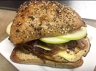 Deli sandwich on a seeded roll from Big Belly Deli