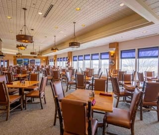 Hickory Dining Room tables beside large windows overlooking Canaan Valley