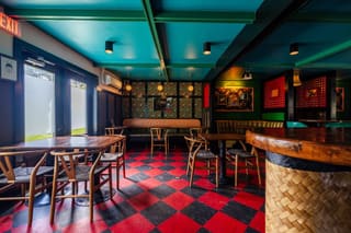Colorful dining room and bar inside ISH Kitchen
