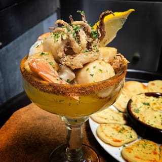 Seafood platter with shrimp, scallops, and fried calamari at Moguls