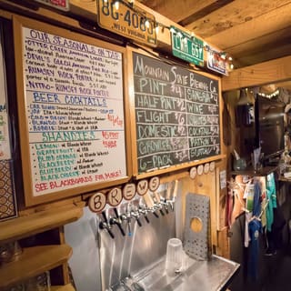 Beer menu boards inside Mountain State Brewing's Thomas pub