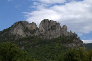 Jagged quartzite fins of Seneca Rocks rising above the forest