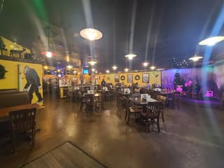 Colorful dining room and bar inside Wicked Wilderness Pub