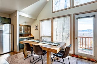 Updated dining room with snow-covered Timberline Mountain in background