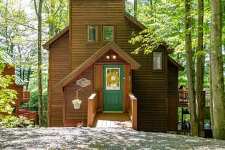 Front view of Trail Magic Chalet in summer