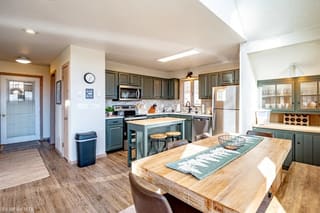 Renovated kitchen with updated dining room and hallway