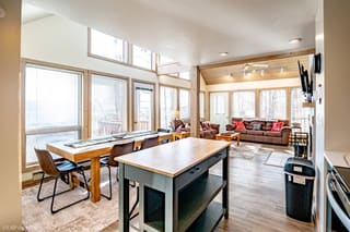 Renovated kitchen with updated dining room and living room with winter theme