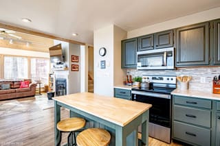 Renovated kitchen with living room with winter theme