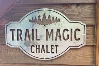 Trail Magic Chalet logo